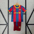 Conjunto Niños FC Barcelona Local Morada y Roja 10/11 - frente