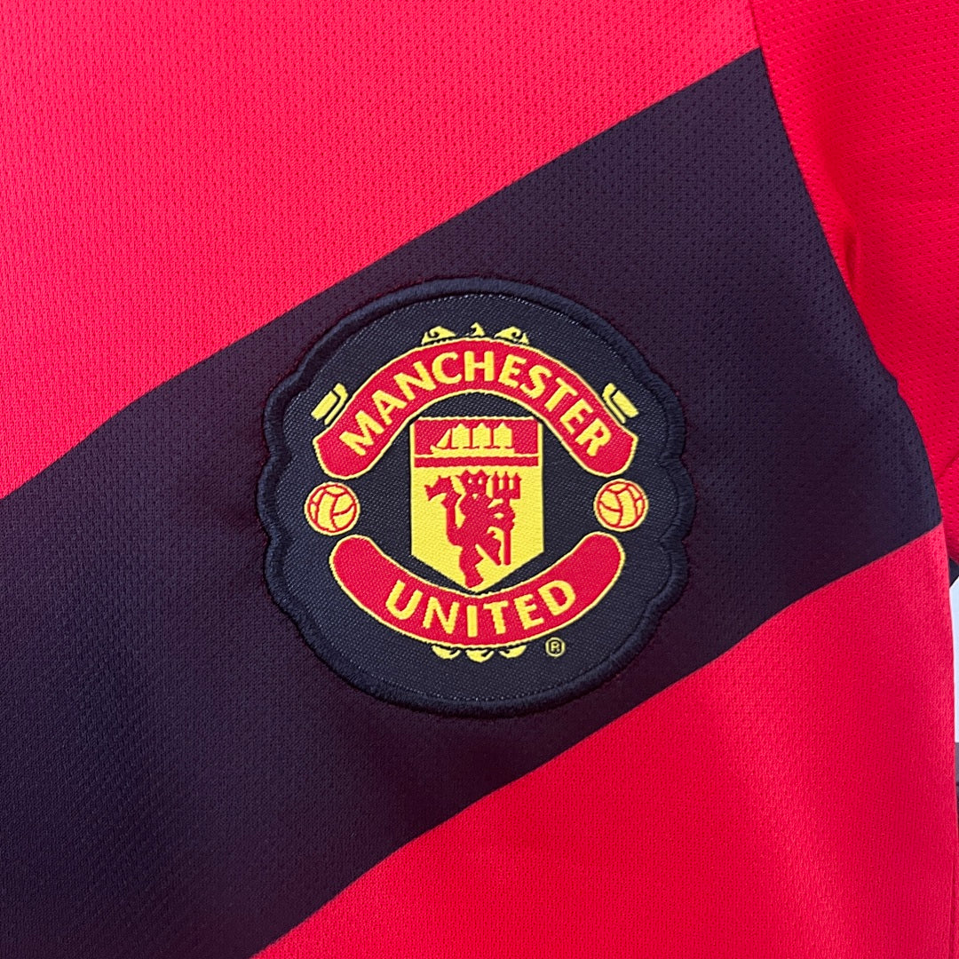 Conjunto Niños Manchester United Local 09/10 - espalda