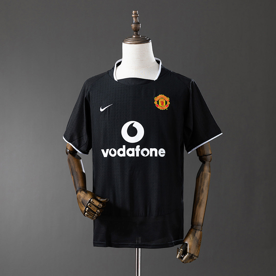 Camiseta Retro Manchester United Visita Negra y Gris 03/05 - frente