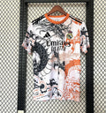 Camiseta Real Madrid Blanca y Naranja Edición Especial 2025/26 - frente