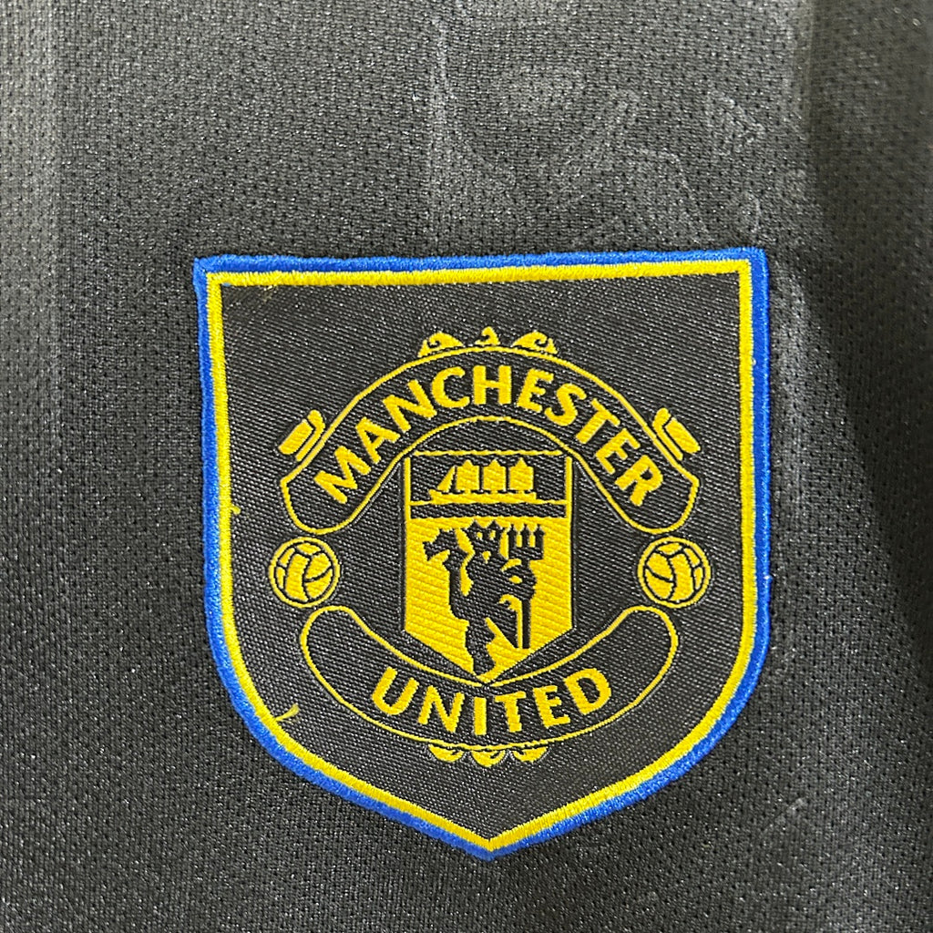 Conjunto Niños Manchester United Tercera 2025/26 - espalda