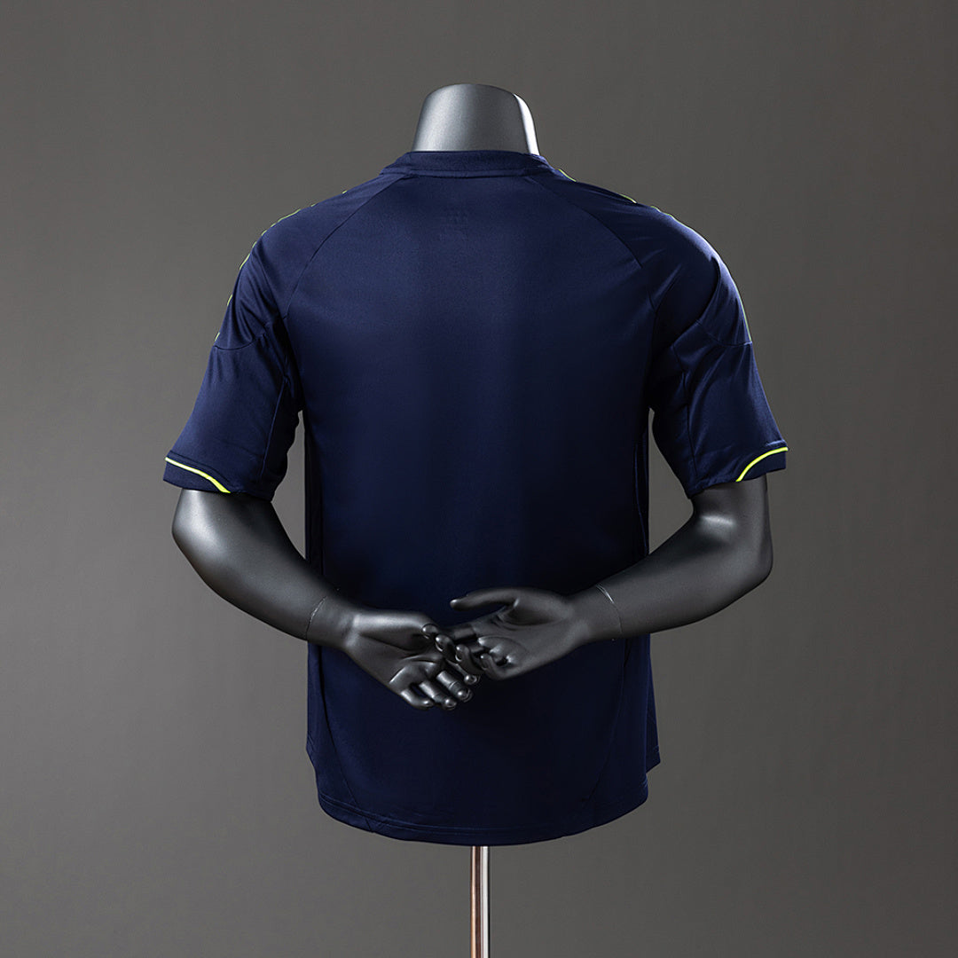Camiseta Retro Real Madrid Visita Azul Marino y Gris 12/13 Versión Jugador - espalda