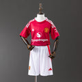 Conjunto Niños Manchester United Local Gris y Roja 2025/26 - frente