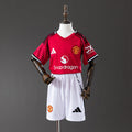 Conjunto Niños Manchester United Local Gris y Morada 2025/26 - frente