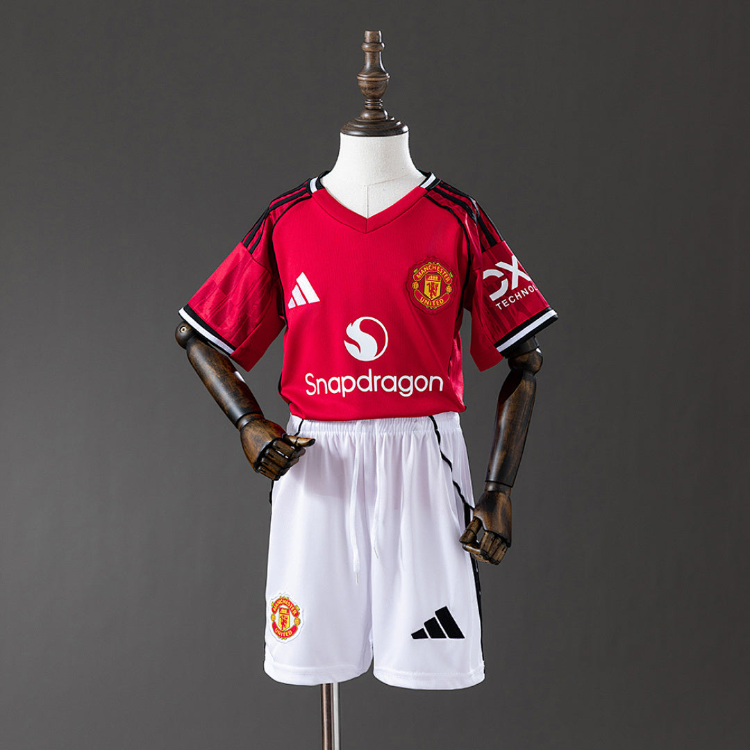 Conjunto Niños Manchester United Local Gris y Morada 2025/26 - frente