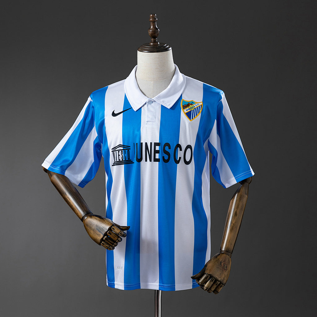 Camiseta Retro Málaga CF Local Celeste y Gris 12/13 - frente